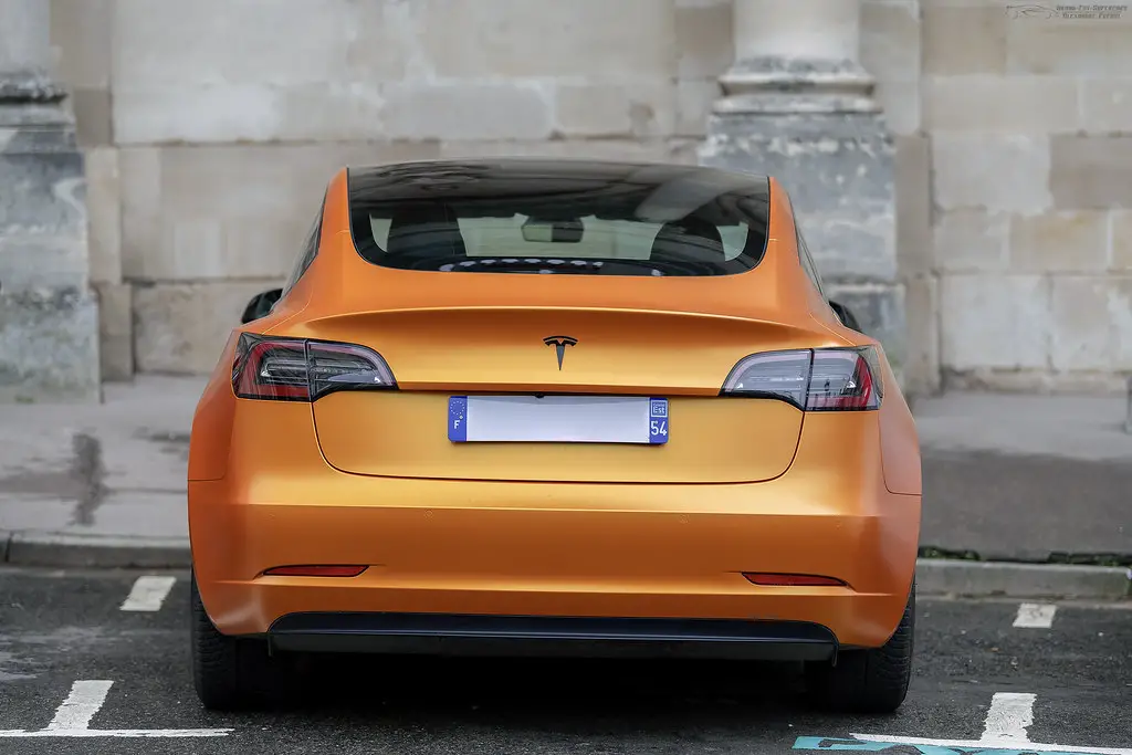 Orange Tesla Model 3