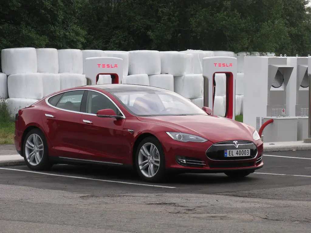charging red Tesla Model S