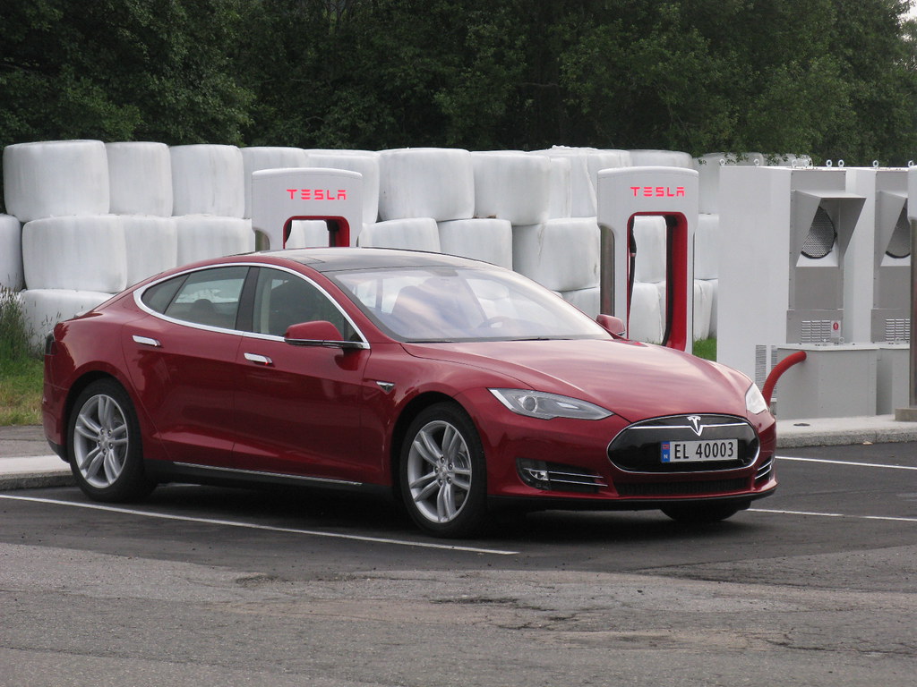 charging red Tesla Model S